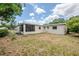 This beautiful home features a huge backyard, perfect for outdoor activities and gatherings at 3025 Bon Air Dr, Orlando, FL 32818