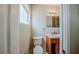 This bathroom features a cherry cabinet and an undermount sink at 3025 Bon Air Dr, Orlando, FL 32818