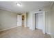 A clean and neutral bedroom is shown with a closet, tile floors, and white trim at 3025 Bon Air Dr, Orlando, FL 32818