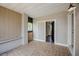This enclosed porch features tile flooring, plenty of light and access to the home at 3025 Bon Air Dr, Orlando, FL 32818