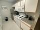 Well-equipped kitchen with stainless steel appliances and granite countertops at 3147 Britannia Blvd # A, Kissimmee, FL 34747