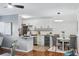 Inviting kitchen with stainless steel appliances, bar seating, and a cozy dining area at 320 Lakeview St # 214, Orlando, FL 32804