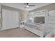 Comfortable bedroom showcasing a bunk bed, closet, and modern decor for a haven at 320 Primrose Dr, Davenport, FL 33837