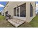 Outdoor living space featuring a patio and screened lanai at 320 Primrose Dr, Davenport, FL 33837