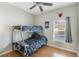 Bedroom with a bunk bed and Dallas Cowboys themed decor at 328 Appaloosa Ct, Sanford, FL 32773