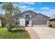 Charming single-Gathering home with a well-manicured lawn and a two-car garage, perfect for a growing Gathering at 328 Appaloosa Ct, Sanford, FL 32773