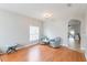 Cozy living room with beautiful hardwood floors, neutral walls, and comfortable seating for relaxing and entertaining at 328 Appaloosa Ct, Sanford, FL 32773
