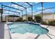 Enclosed pool with outdoor seating and lush landscaping at 328 Appaloosa Ct, Sanford, FL 32773