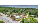 Expansive aerial shot showcasing property's location with mature trees and proximity to the water at 335 Debary Ave, Debary, FL 32713