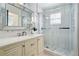 Elegantly designed bathroom with stylish vanity, and glass-enclosed shower at 335 Debary Ave, Debary, FL 32713