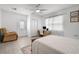 Bright bedroom with a work space, offering a cozy recliner and good natural light at 335 Debary Ave, Debary, FL 32713