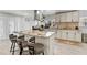 Modern kitchen featuring an island with bar seating, stainless steel appliances, and sleek countertops at 335 Debary Ave, Debary, FL 32713