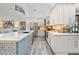 Stylish kitchen featuring white cabinets, quartz countertops and stainless-steel appliances at 335 Debary Ave, Debary, FL 32713