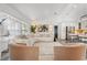 Bright living room with vaulted ceilings, large windows, and a spacious seating area at 335 Debary Ave, Debary, FL 32713