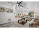 Inviting living room featuring hardwood floors, modern furnishings, and an open layout to the kitchen at 335 Debary Ave, Debary, FL 32713