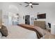 Spacious main bedroom showcasing an en-suite bathroom and walk-in closet at 335 Debary Ave, Debary, FL 32713