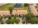 Aerial view of townhomes with a community pond at 3567 Shallot Dr # 103, Orlando, FL 32835