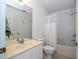 Bathroom with shower/tub, white tile, and white vanity at 3567 Shallot Dr # 103, Orlando, FL 32835