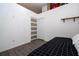 Bedroom with sliding closet doors, high ceilings and laminate flooring at 3567 Shallot Dr # 103, Orlando, FL 32835