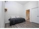 Bedroom with high ceilings, laminate floors and access to a bathroom at 3567 Shallot Dr # 103, Orlando, FL 32835