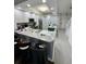 Bright eat-in kitchen featuring a granite countertop, sleek appliances, and pendant lighting at 3567 Shallot Dr # 103, Orlando, FL 32835