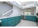 Open concept kitchen featuring granite countertops, stainless steel appliances, and tile flooring at 3567 Shallot Dr # 103, Orlando, FL 32835