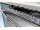 Close up on the stainless steel front panel of a Frigidaire Gallery dishwasher at 3567 Shallot Dr # 103, Orlando, FL 32835