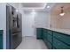 Bright kitchen featuring stainless steel appliances, ample counter space, and decorative backsplash at 3567 Shallot Dr # 103, Orlando, FL 32835