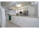 Open concept kitchen with stainless steel appliances and granite countertops at 3567 Shallot Dr # 103, Orlando, FL 32835