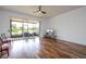 Inviting living room with screened lanai and scenic water views at 3567 Shallot Dr # 103, Orlando, FL 32835