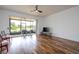 Bright living room with screened lanai and scenic water views at 3567 Shallot Dr # 103, Orlando, FL 32835