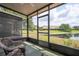 Screened in patio with peaceful view of the water at 3567 Shallot Dr # 103, Orlando, FL 32835