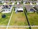 Large backyard with a white fence, swimming pool and a trampoline on the lawn at 3829 Allegany Ln, Sanford, FL 32771