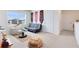 Comfortable bedroom featuring a futon, beanbag chair, and ample natural light at 3829 Allegany Ln, Sanford, FL 32771