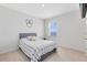 Cozy bedroom featuring neutral walls, plush carpet, and a bright window for a comfortable and relaxing space at 3829 Allegany Ln, Sanford, FL 32771