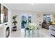 Breakfast nook with lemon furniture set and large glass doors to exterior at 3829 Allegany Ln, Sanford, FL 32771
