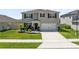 Charming two-story home with well-manicured lawn and two car garage at 3829 Allegany Ln, Sanford, FL 32771