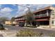 A vibrant business district with appealing architecture, outdoor seating, and pedestrian-friendly brick sidewalks at 3829 Allegany Ln, Sanford, FL 32771