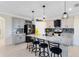 Spacious kitchen with granite countertops, stainless appliances, and breakfast bar at 3829 Allegany Ln, Sanford, FL 32771