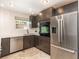 Modern kitchen with stainless steel appliances, sleek cabinetry, and elegant countertop at 4332 Lake Underhill Rd # 12D10, Orlando, FL 32803