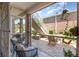 Charming screened-in patio with comfortable seating and lush greenery views at 4332 Lake Underhill Rd # 12D10, Orlando, FL 32803