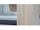 Brightly lit bedroom showcasing a queen sized bed at 4725 Coral Castle Dr, Kissimmee, FL 34746