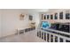This cozy bedroom features a bunk bed and neutral decor for a comfortable and inviting space at 4725 Coral Castle Dr, Kissimmee, FL 34746