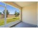 Screened in porch that overlooks yard and neighborhood at 4725 Coral Castle Dr, Kissimmee, FL 34746
