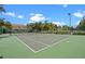 Well-maintained tennis courts in a lush community setting at 4725 Coral Castle Dr, Kissimmee, FL 34746