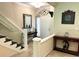 Inviting foyer with tiled flooring, staircase, and decorative accents at 5114 Hawkstone Dr, Sanford, FL 32771