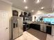 Well-equipped kitchen featuring stainless steel appliances and granite countertops, perfect for cooking at 5114 Hawkstone Dr, Sanford, FL 32771