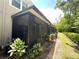 Enjoy outdoor living on this screened patio, perfect for relaxing or entertaining amidst lush greenery at 5114 Hawkstone Dr, Sanford, FL 32771
