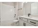 Bathroom with a tub, vanity, and white walls at 5254 Citrus Leaf Blvd, Winter Garden, FL 34787