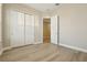 Bedroom with wood floors, natural light, and a closet at 5254 Citrus Leaf Blvd, Winter Garden, FL 34787